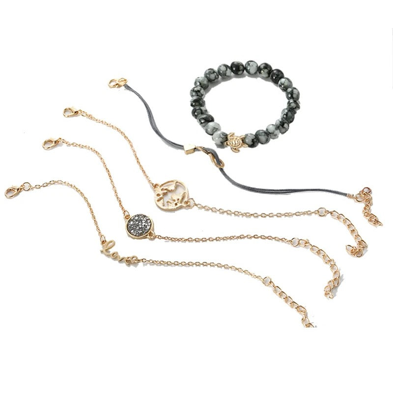 "Tropical Bliss: 5-Piece Set with Turtle Charm Bead Bracelet and Gold Color Strand Bracelets with Charms for Women"