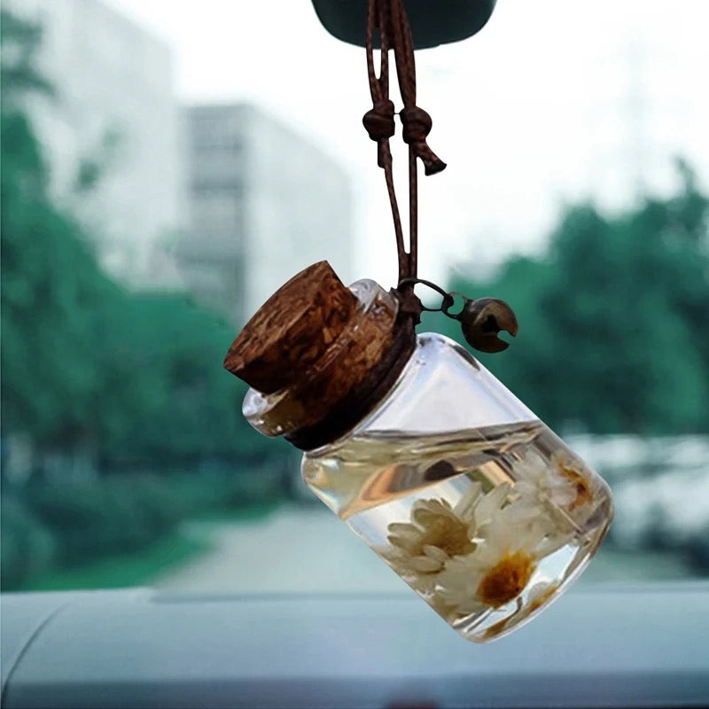 "Essential Drive: Car Pendant Air Freshener Bottle for Essential Oils - Stylish Auto Ornament and Car-styling Accessory"