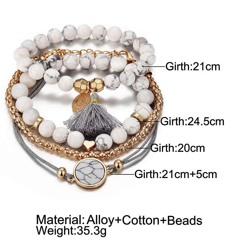 "Harmony Charms: Stone and Bead Bracelet Set with Heart and Tassel Accents"