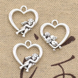 "Love's Embrace: Heart Charm with Cupid Angel" (1pc)