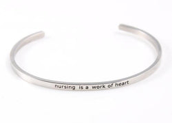 "NURSING IS A WORK OF HEART" Engraved Stainless Steel Inspirational Cuff Bracelet